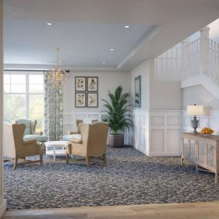 A cozy living room with elegant furniture and decor.