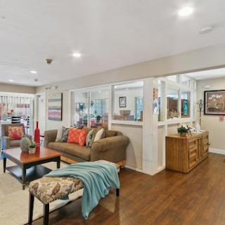 A cozy and modern living room featuring stylish furniture and a warm ambiance.