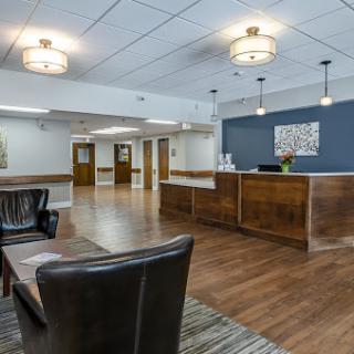 A welcoming reception area featuring modern design and comfortable seating.