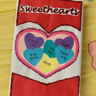 Colorful Valentine's Day sweethearts artwork featuring heart-shaped candies with messages.