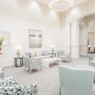 A spacious, modern lobby with comfortable seating and elegant decor.