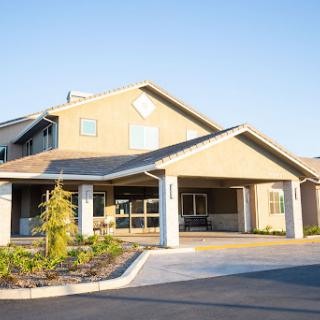 A welcoming residential building captured in bright daylight.