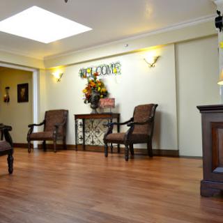 A thoughtfully designed lobby area featuring elegant furniture and a bright atmosphere.