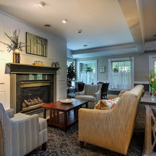 Cozy living room with a fireplace and comfortable seating.