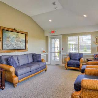 A cozy living room with stylish furniture and natural lighting.