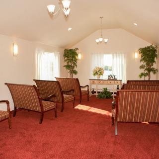 A cozy room with comfortable seating and warm lighting.