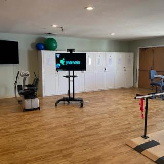 A well-equipped physical therapy room designed for rehabilitation exercises.