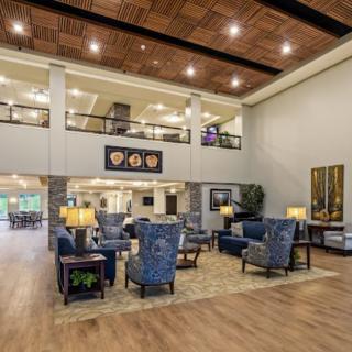 Spacious and modern lobby with comfortable seating and elegant decor.
