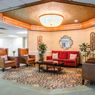 A cozy lobby area with comfortable seating and elegant decor.