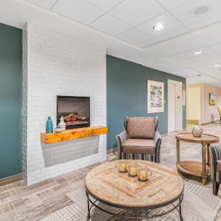 A cozy and modern living space featuring comfortable seating and stylish decor.