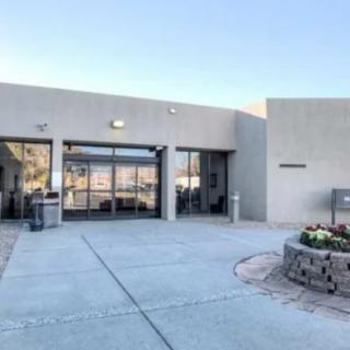 Modern building entrance on a clear day.