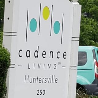 Sign for Cadence Living in Huntersville.