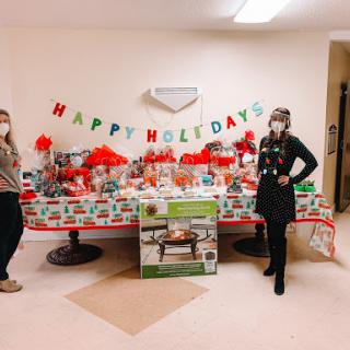 Celebrating the holidays with a festive display filled with gifts and cheerful decorations.