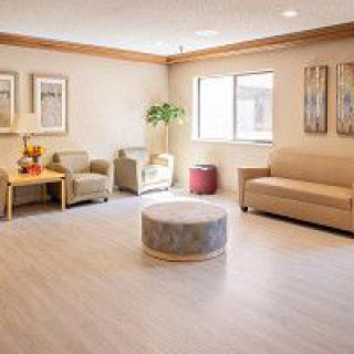 A modern living room with comfortable seating and tasteful decor.