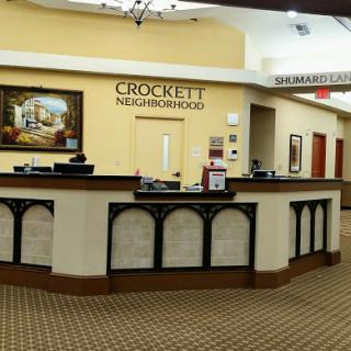 The welcoming reception area of Crockett Neighborhood, featuring a stylish design and friendly ambiance.