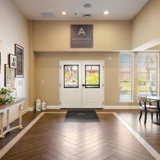 A welcoming lobby with modern decor and abundant natural light.