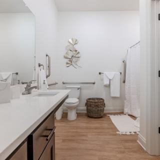 A modern bathroom featuring sleek fixtures and a clean, minimalist aesthetic.