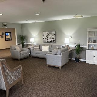 A cozy and inviting living room area with modern furniture and soft lighting.