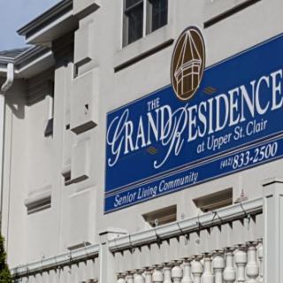 The Grand Residence at Upper St. Clair with a prominent exterior sign.