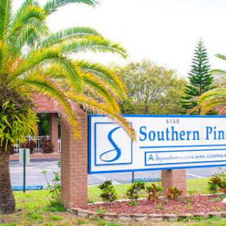 Welcome to Southern Pines, surrounded by lush palm trees.