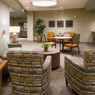 A cozy waiting area featuring comfortable seating and modern decor.
