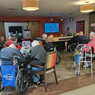 A lively community space where senior citizens gather for activities and social interaction.