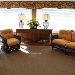 A cozy living room setup with comfortable seating and ambient lighting.