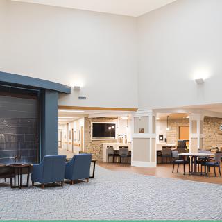 A modern lobby with comfortable seating and stylish decor.