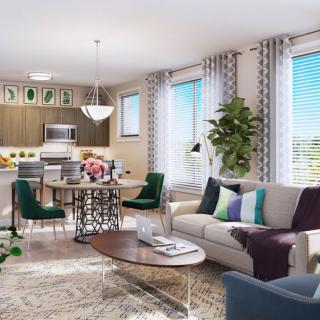 A modern open-space living room and kitchen with stylish decor and furniture.