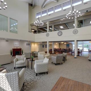 A spacious, modern lobby with comfortable seating and stylish lighting.