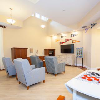 A cozy and modern living room setup with comfortable seating and a welcoming ambiance.