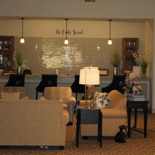 A cozy lounge area with comfortable seating and ambient lighting.