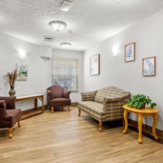 A cozy living room with comfortable seating and stylish decor.