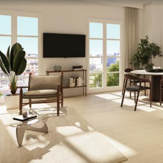 A modern living room with minimalist decor and abundant natural light.