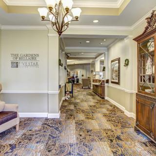 Luxurious hallway with elegant decor and lighting.