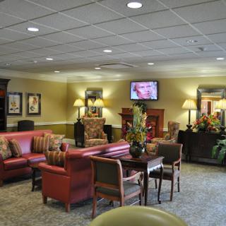 A cozy and inviting lobby area with comfortable seating and warm decor.