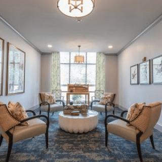 A cozy living room with elegant seating arrangement and decor.