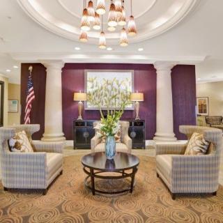 A beautifully decorated hotel lobby with comfortable seating and elegant lighting.