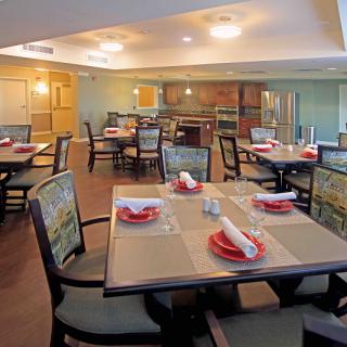 A well-arranged dining area with tables set for service.