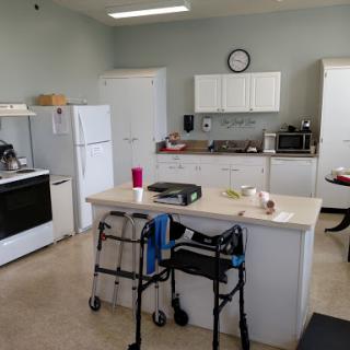 A spacious kitchen featuring modern appliances and a functional layout.
