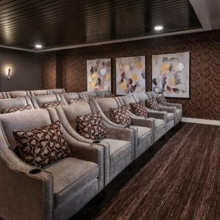 A luxurious home theater with comfortable seating and stylish decor.