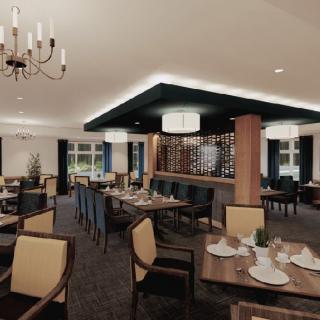 A sophisticated restaurant interior featuring elegantly set tables and modern decor.