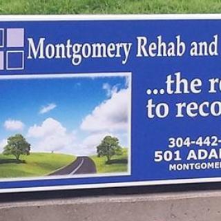 Montgomery Rehab and the road to recovery sign displaying contact details.