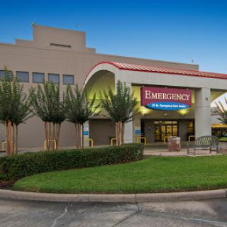 The exterior view of an emergency services building, featuring modern architecture and landscaping.