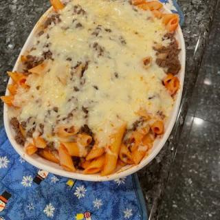 A delicious baked pasta dish topped with melted cheese.
