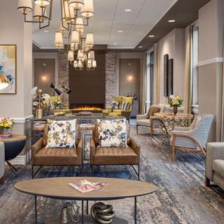 A modern living room with elegant furniture and stylish lighting.