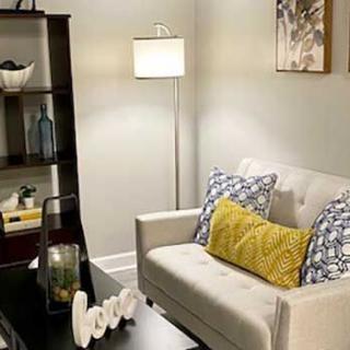 A cozy living room with a comfortable sofa and stylish decor.