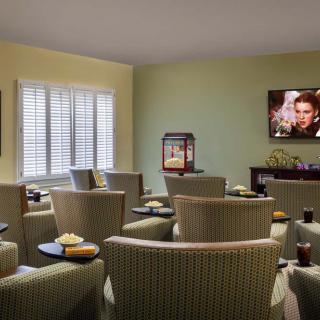 Cozy home theater setup with comfortable seating and popcorn.