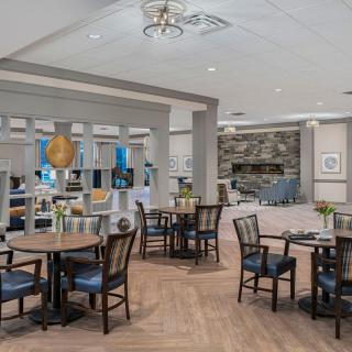 Modern dining and lounge area with stylish furnishings.