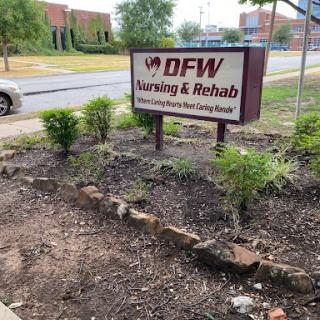 Sign for DFW Learning & Rehab with landscaping in front.